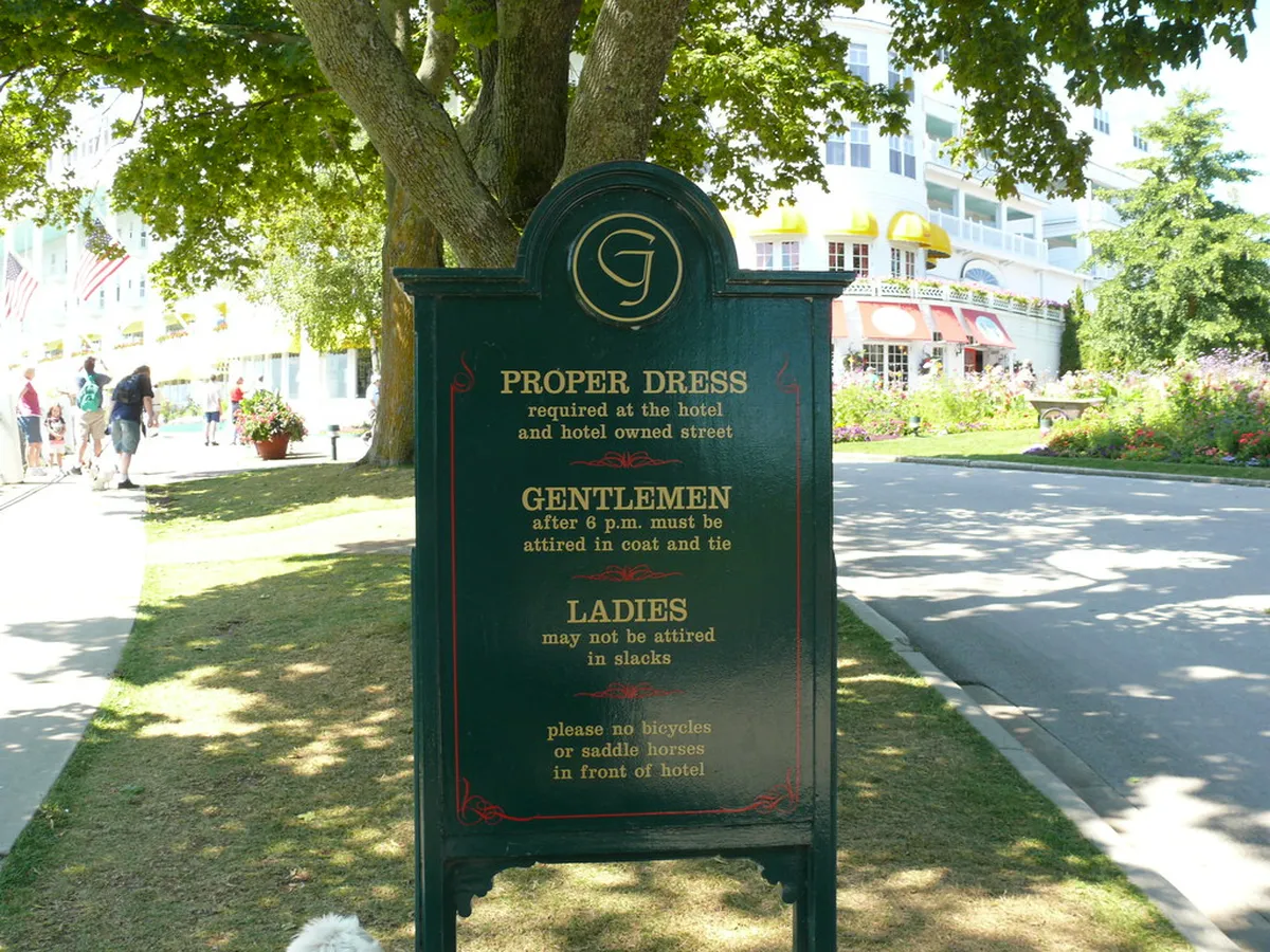 Grand Hotel dress-code sign beside the hotel grounds on Mackinac Island