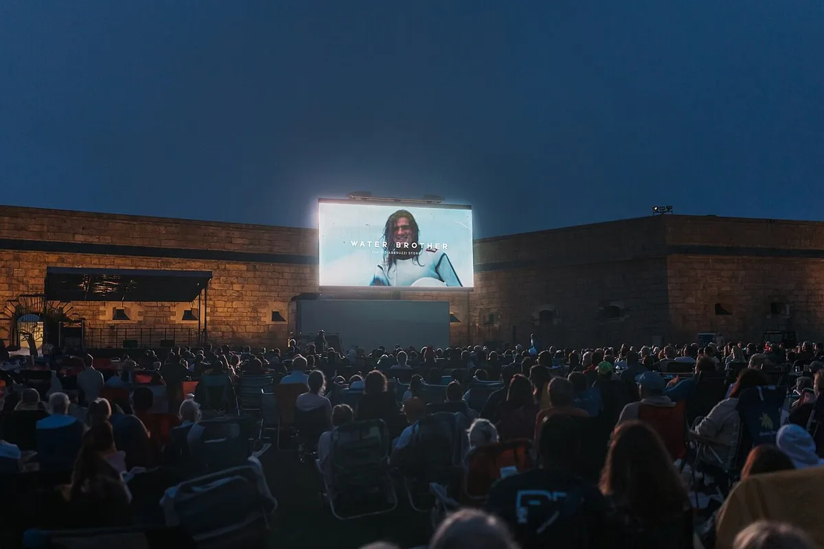 Large crowd watches 'Water Brother - The Sid Abbruzzi Story' at Fort Adams during NewportFILM premiere (2023) — 1